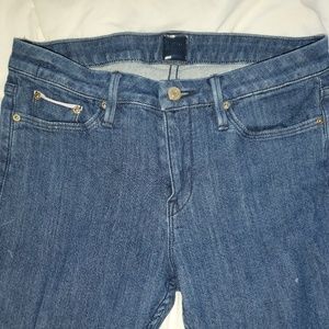 Blue jeans with small pink detailing